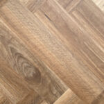 HTT Obsidian Herringbone Spotted Gum Hybrid Flooring