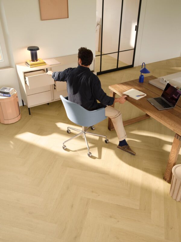 Quick-Step Impressive laminate flooring in Nutmeg Oak laid in a residential interior