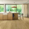 Quick-Step Impressive Ultra Almond Oak laminate flooring in a room setting