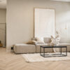 ArtiFloor Premium Herringbone Hamptons Haze vinyl flooring installed in a neutral living room