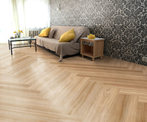 ArtiFloor Premium Herringbone Sandlight vinyl flooring installed in a living room