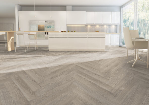 ArtiFloor Premium Herringbone Mistwood vinyl flooring installed in a white kitchen