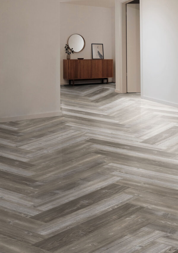 ArtiFloor Premium Herringbone Grey River Pine vinyl flooring installed in a hallway