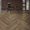 ArtiFloor Premium Herringbone Rustic Path vinyl flooring installed in a dining room