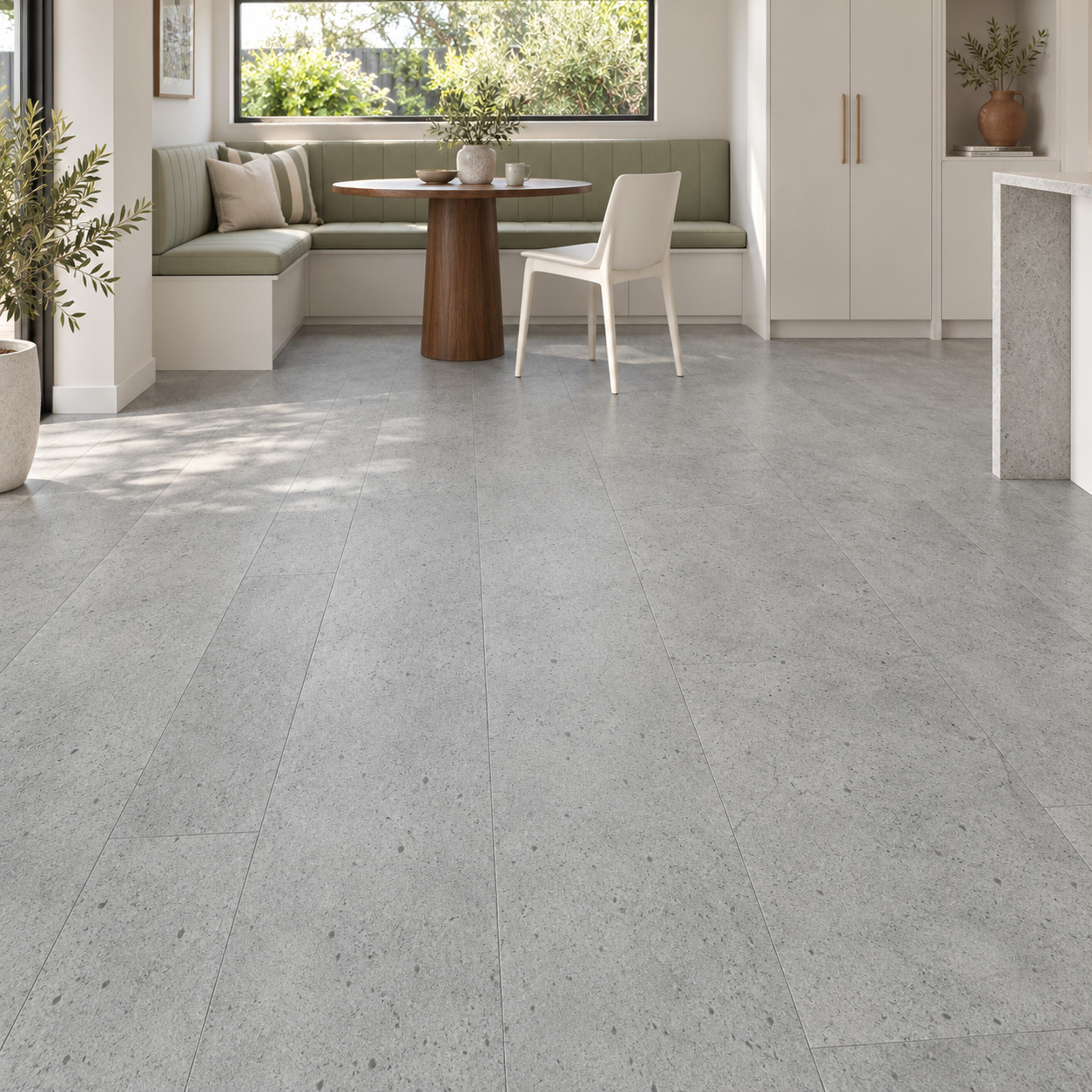 Signature Quattro Argento Hybrid Flooring shown in a furnished home interior with flooring clearly visible.