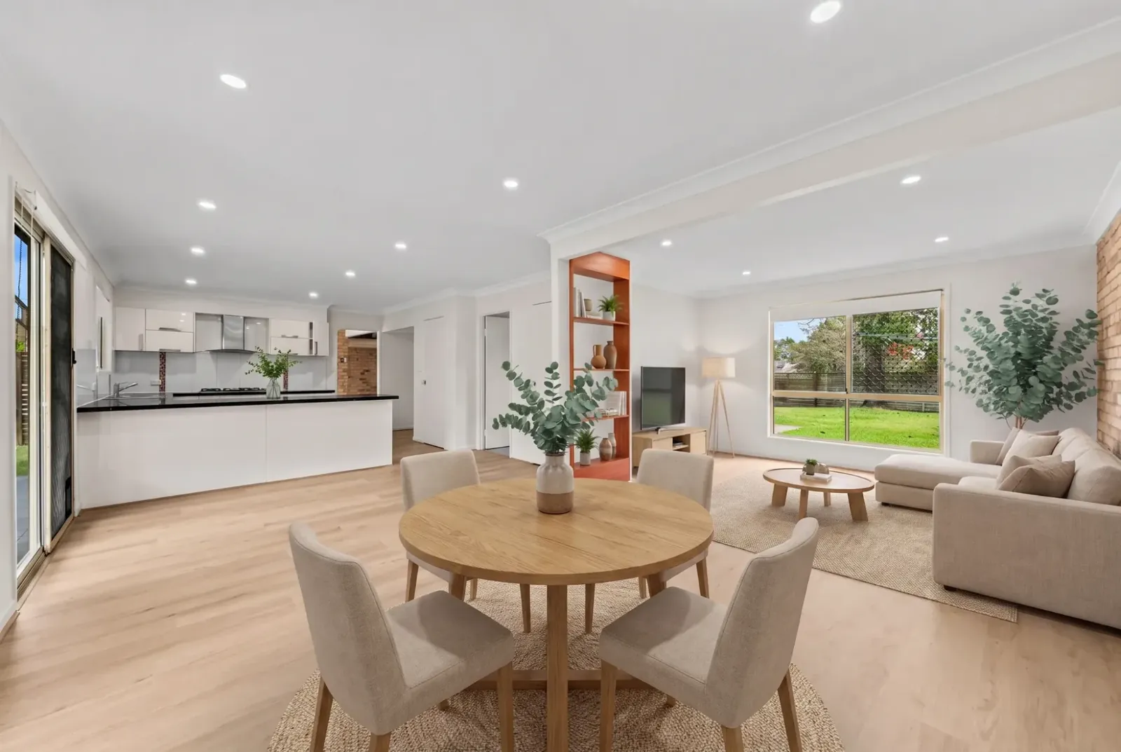 Open-plan living and dining room with BestBuys Neutral Oak hybrid flooring