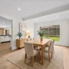 Dining room with timber table and BestBuys Neutral Oak hybrid flooring